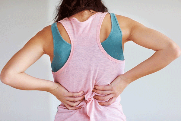 Đau thắt lưng, vùng chậu là một trong những biểu hiện của bệnh ung thư cổ tử cung giai đoạn đầu